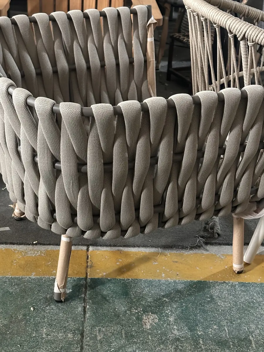 Woven rope lounge chair in construction
